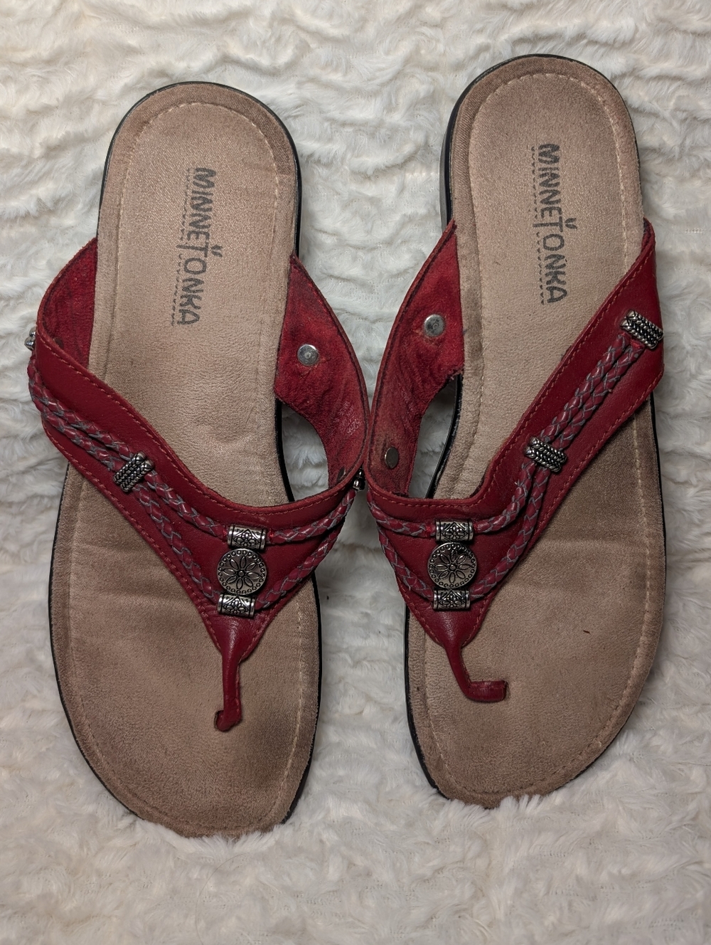 Minnetonka Women's Red Braided Thong Sandals with Decorative Conchos